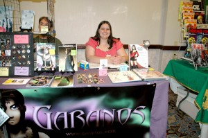 Alex sitting at her Artist Alley table at SPACE 2010.